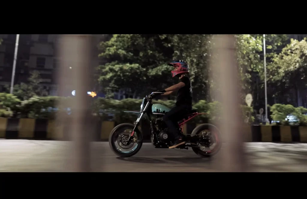 Automotive photography of a boy riding a bike customized by Bombay Local by Bombay Custom Works.