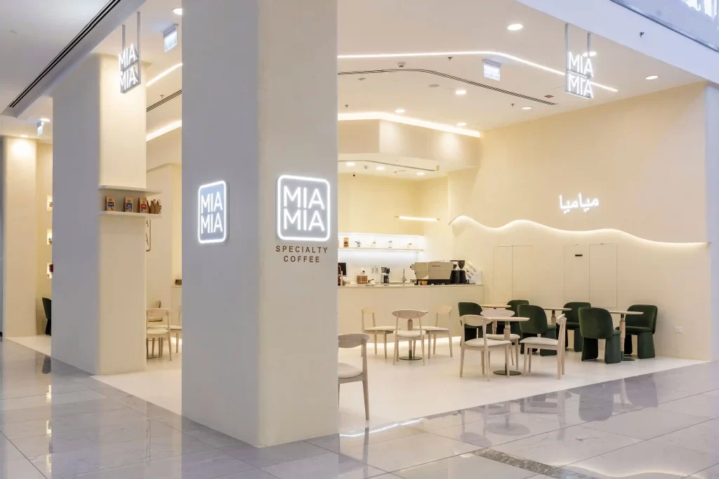 Architectural photography of MIA MIA Cafe in Dubai, showcasing its stunning modern design and vibrant seating area.