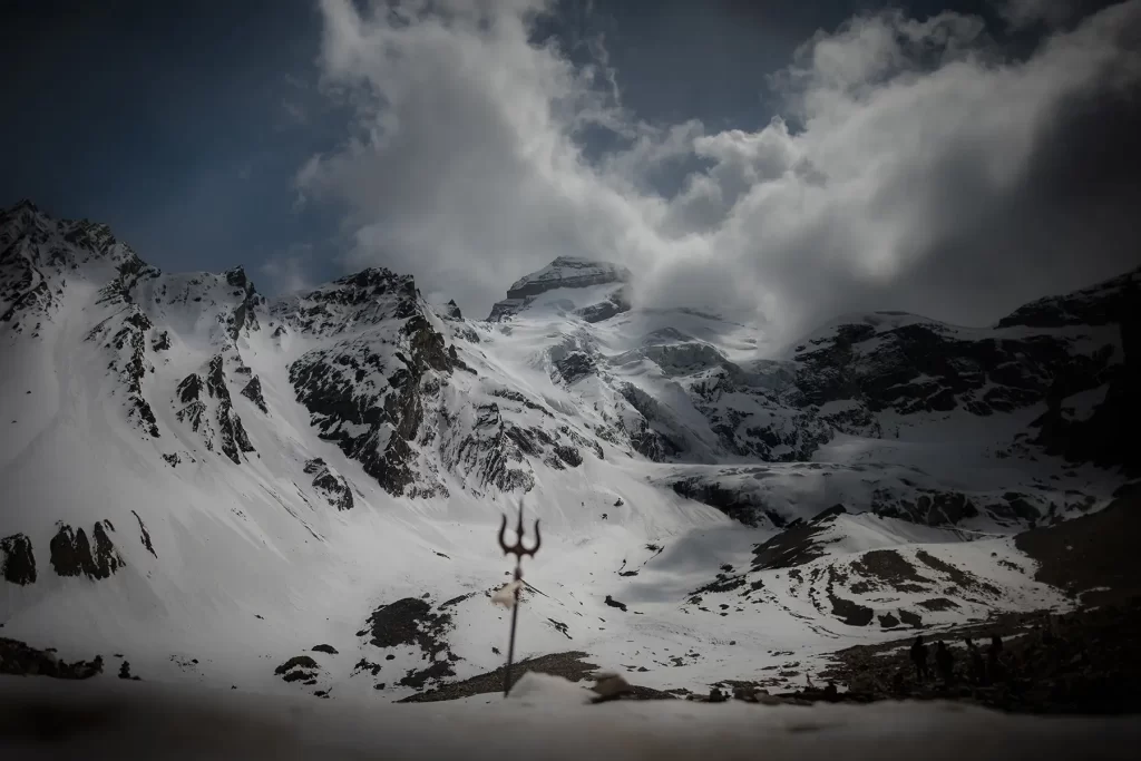 Scenic view of Adi Kailash featuring a Trishul (trident) in the foreground.