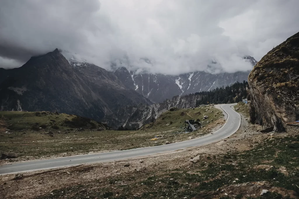 Scenic routes and views captured in automotive photography on the journey to Adi Kailash and Om Parvat.